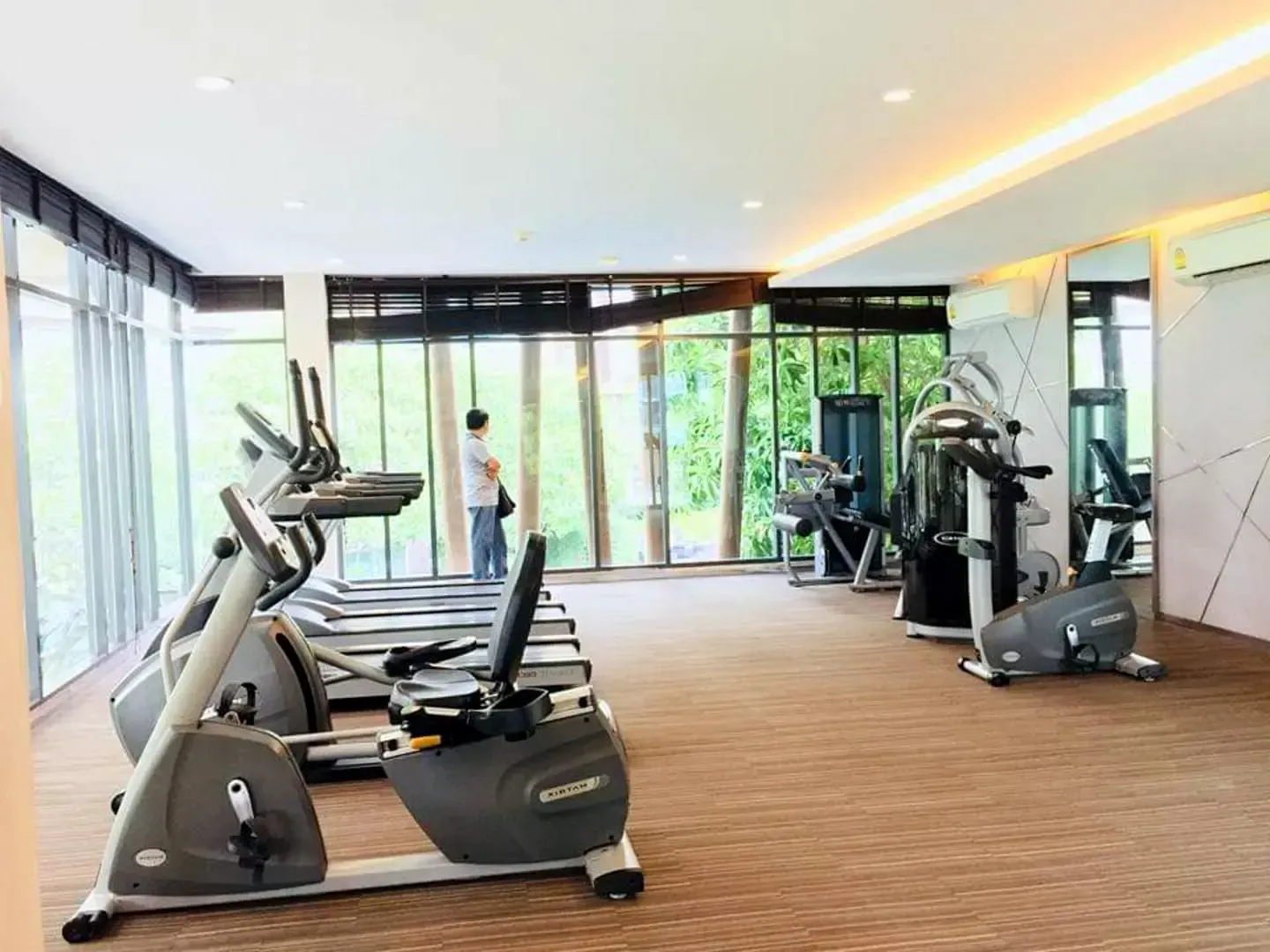 Fully equipped fitness center with cardio and weight equipment